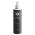 Black bottle of Purifying Mousse with white pump on a light gray background