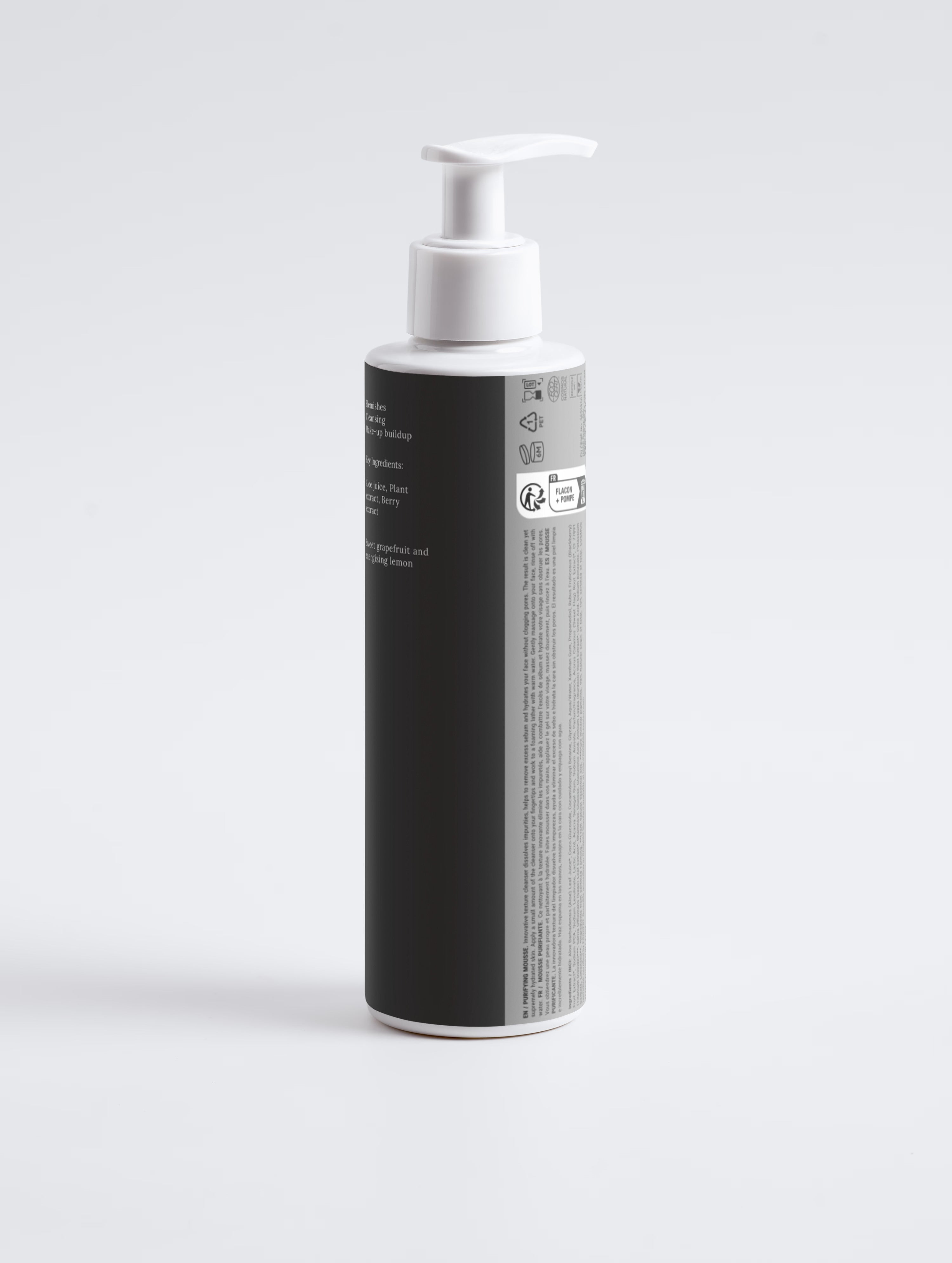 Black bottle with white pump on a light gray background